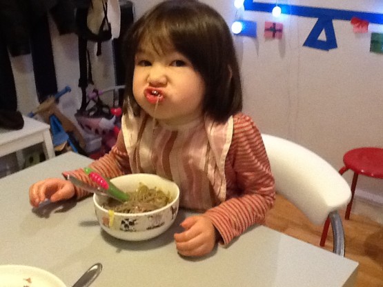 Ammie eats noodles